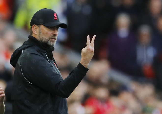 Jürgen Klopp se čudi, da ljudje volijo osebnosti in ne programov. FOTO: Phil Noble Reuters
