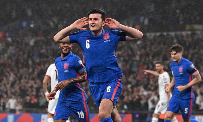 Poteza, ki ni navdušila strokovnih komentatorjev in nekaterih navijačev: Harry Maguire proslavlja gol proti Albaniji. FOTO: Glyn Kirk/AFP
