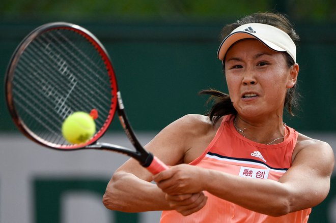 Shuai Peng (na fotografiji) med nastopom na OP Francije v Parizu leta 2018. FOTO: Eric Feferberg/AFP
