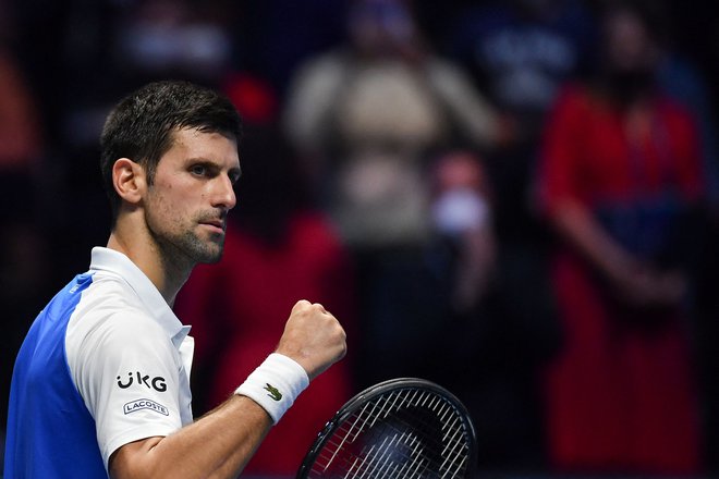 Novak Đoković se je tudi v Torinu moral braniti pred očitki. FOTO: Marco Bertorello/AFP
