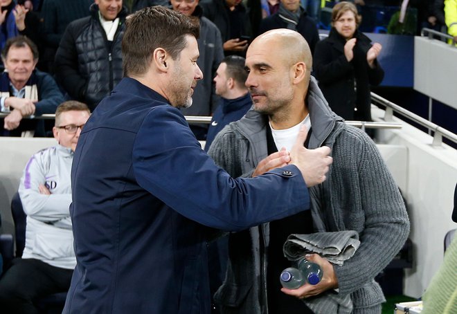 Mauricio Pochettino (levo) in Josep Guardiola sta bila v določenem obdobju svojih karier blizu prevzema Manchester Uniteda. FOTO: Ian Kington/AFP
