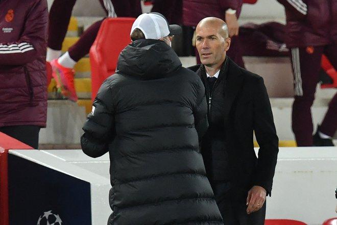 Zinedine Zidane (na fotografiji) med tekmo z Liverpoolom v ligi prvakov. FOTO: Paul Ellis/AFP
