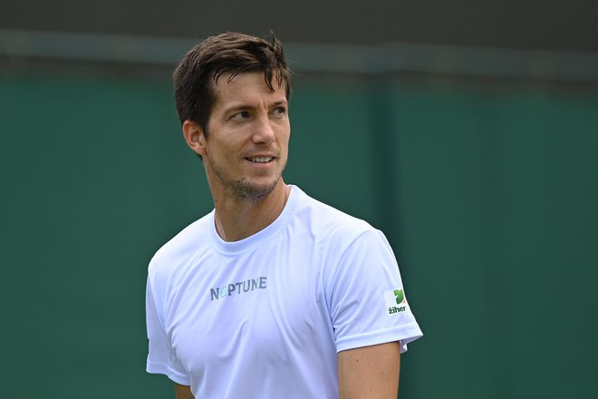 Tudi pri slovenski ekipi za Davisov pokal upajo, da se bo Aljaž Bedene po zdravstvenih težavah uspešno vrnil na igrišče.&nbsp;FOTO:&nbsp;Glyn Kirk/AFP
