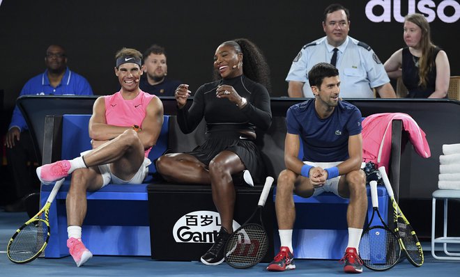 Od velike teniške trojke Rafalea Nadala (levo), Serene Williams in Novaka Đokovića bo prvi veliki slam v novem letu izpustila le Američanka. FOTO: William West/AFP
