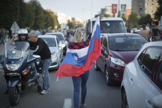 Katera barva bo v Sloveniji prebarvala slovensko trobojnico? FOTO:&nbsp;Jure Eržen/Delo
