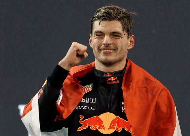 Max Verstappen se je takole veselil končne zmage. FOTO: Kamran Jebreili/AFP
