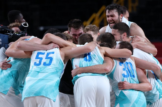 Slovenski košarkarji so tako v Litvi kot v Tokiu navdušili rojake ter si četrtič prislužili laskavi naziv slovenske ekipe leta. FOTO: Thomas Coex/AFP
