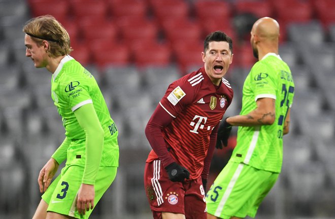 Robert Lewandowski se je v izjemnem slogu podpisal pod nov zgodovinski dosežek. FOTO: Andreas Gebert/Reuters
