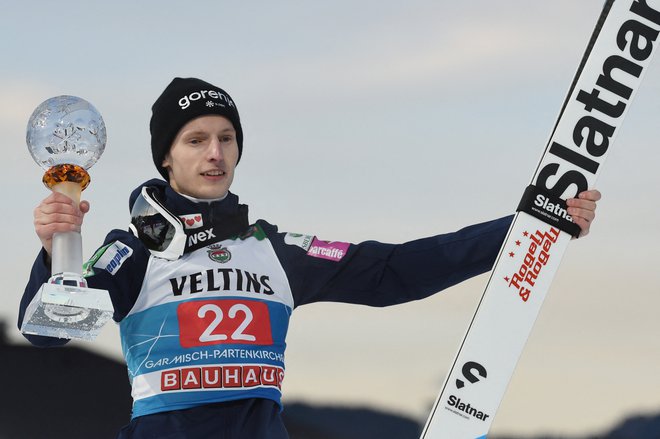 Lovro Kos je na novega leta dan v Garmisch-Partenkirchnu navdušil s sijajnim tretjim mestom. FOTO: Christof Stache/AFP
