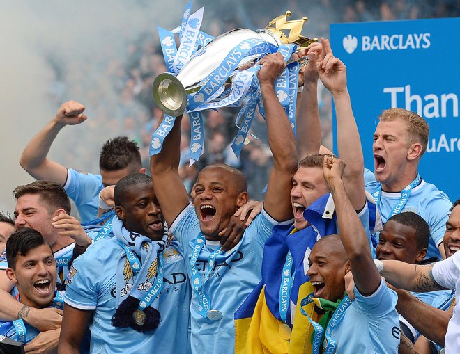 Vincent Kompany (v sredini) je vrsto let zmagoval v majici Manchester Cityja, zdaj želi prenesti uspešnost na klop Anderlechta. FOTO: Andrew Yates/AFP
