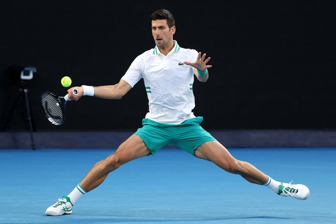 Novak Đoković je med lanskim nastopom v finalu odprtega prvenstva Avstralije zmagal še devetič. FOTO: David Gray/AFP
