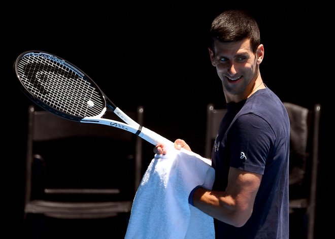 Novak Đoković med treningom v Melbourne Parku po izpustitvi na prostost. FOTO:&nbsp;William West/AFP
