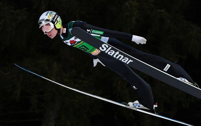 Anže Lanišek v zadnjem obdobju iz tekme v tekmo spet potrjuje vrhunsko pripravljenost. Foto Thomas Kienzle/AFP
