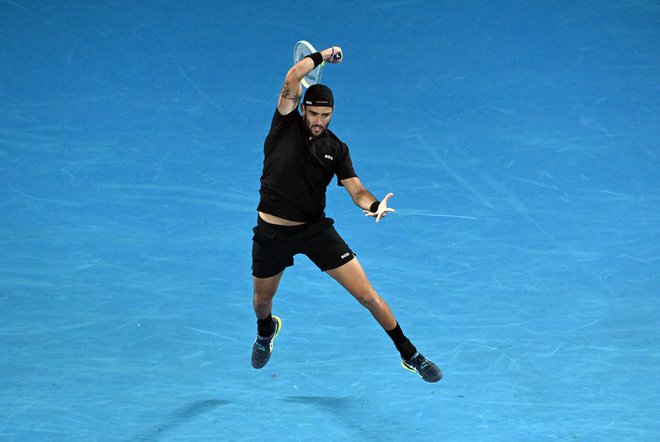 Matteo Berrettini med maratonom z Gaelom Monfilsom. FOTO: Morgan Sette/Reuters
