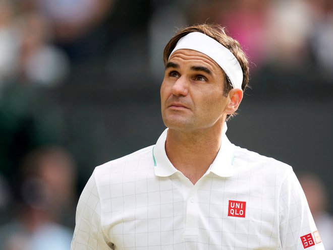 Roger Federer med julijskim nastopom v Wimbledonu, kjer ga je prepričljivo v četrtfinalu ugnal Poljak Hubert Hurkacz. FOTO: Peter van den Berg/USA TODAY Sports
