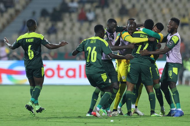 Senegalci slavijo po prvem golu v polfinalu. FOTO: Kenzo Tribouillard/AFP
