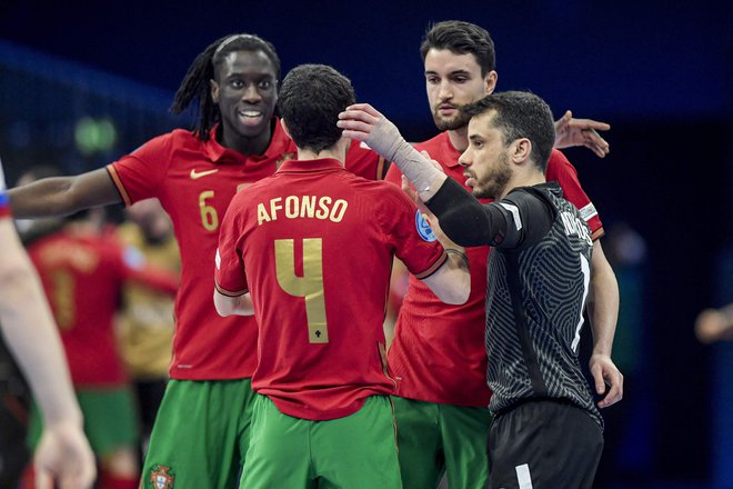 Portugalci so se veselili novega velikega uspeha. FOTO: Gerrit Van Keulen/AFP
