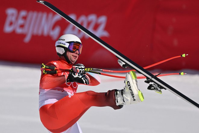 Švicar Beat Feuz je pri 34 letih starosti dopolnil zbirko lovorik v karieri še z najprestižnejšo. FOTO: Joe Klamar/AFP
