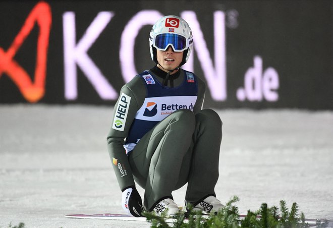 Norveški smučarski skakalec Johann Andre Forfang bo zaradi okužbe z novim koronavirusom ostal brez olimpijskega nastopa. FOTO: Annegret Hilse/Reuters
