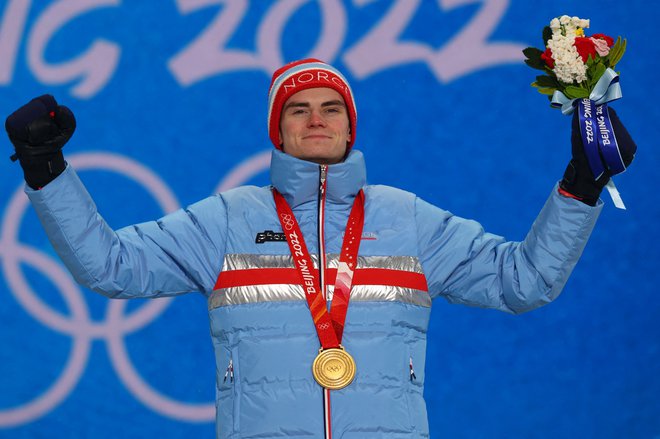 Marius Lindvik je prvi norveški olimpijski prvak na veliki skakalnici po letu 1964. FOTO: Lindsey Wasson/Reuters
