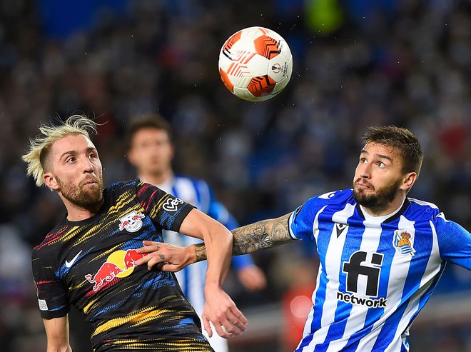 Kevin Kampl (levo) je z Leipzigom položil Real Sociedad na pleča. FOTO: Ander Gillenea/AFP
