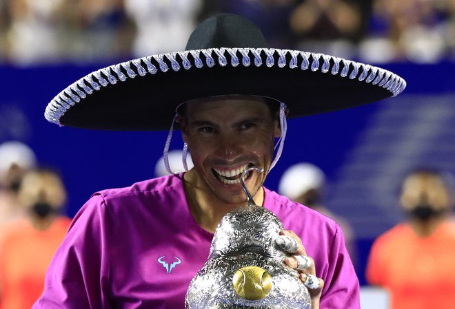 Španski teniški as Rafael Nadal je začel leto 2022 na silovit način. FOTO: Henry Romero/Reuters
