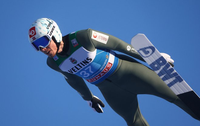 Norvežan Johann Andre Forfang je bil najboljši v kvalifikacijah Lillehammerja. FOTO: Kai Pfaffenbach/Reuters
