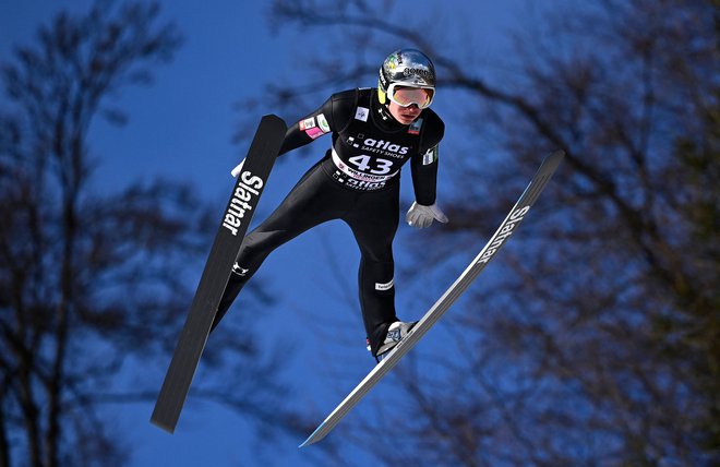 Anže Lanišek je poletel do 13. mesta. FOTO: Ina Fassbender/AFP
