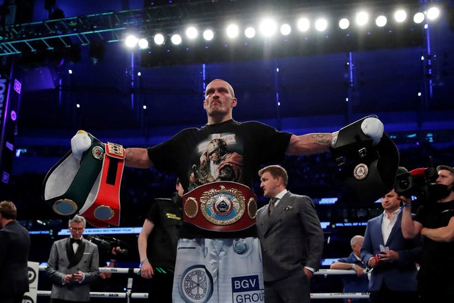 Oleksandr Usik si je septembra lani priboksal naslove svetovnega prvaka v težki kategoriji po različicah IBF, WBA in WBO. FOTO: Andrew Couldridge/Reuters
