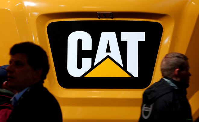 Ustavitev dejavnosti v svojih ruskih proizvodnih obratih je naznanil tudi proizvajalec težke gradbene opreme Caterpillar. FOTO: Michaela Rehle/Reuters
