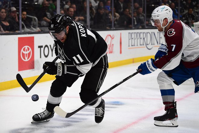 Anže Kopitar (levo) in kralji so občutili moč vodilnega moštva v ligi NHL. FOTO: Gary A. Vasquez/Usa Today Sports
