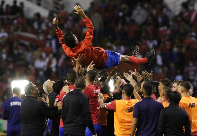 Nogometaši Kostarike so se veselili zmage proti ZDA, ki jim je prinesla dodatni kvalifikacijski tekmi proti Novi Zelandiji. FOTO: Mayela Lopez/Reuters
