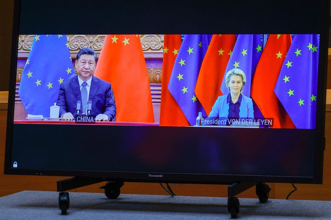 China's President Xi Jinping (L) and European Commission President Ursula von der Leyen speak via video-conference with European Council President and European Union foreign policy chief during an EU China summit at the European Council building in Brussels, on April 1, 2022. (Photo by Olivier Matthys / POOL / AFP)