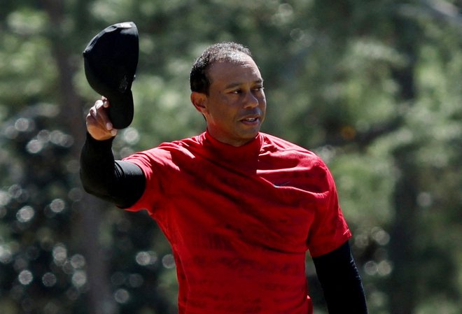 Tiger Woods, petkratni zmagovalec turnirja v Augusti, je bil zadovoljen že s tem, da je zmogel končati turnir po hudi avtomobilski nesreči.. FOTO: Mike Segar/Reuters
