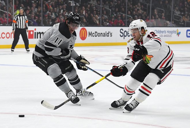 Anže Kopitar (desno) je po treh porazih popeljal Los Angeles Kings do pomembne zmage v bitki za končnico. FOTO: Jayne Kamin-oncea/Usa Today Sports
