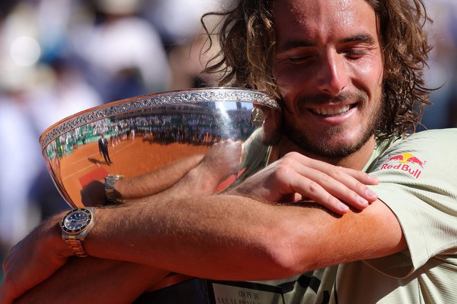 Stefanos Tsitsipas je ponovil lansko zmago na teniškem turnirju v Monte Carlu. FOTO: Valery Hache/AFP
