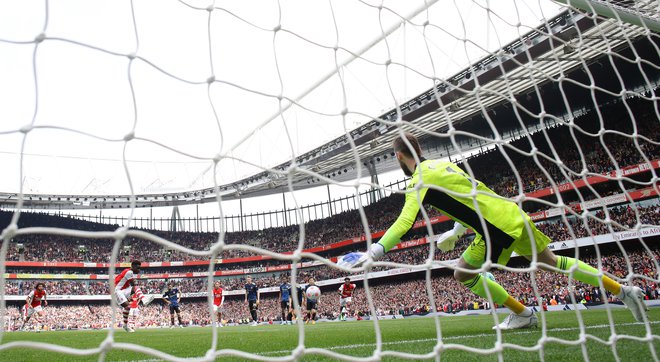 Bukayo Saka je bil zanesljiv z bele točke. FOTO: David Klein/ Reuters
