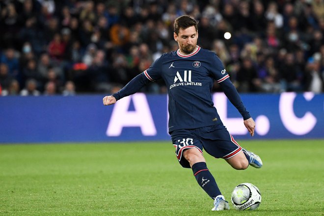 Lionel Messi je bil strelec gola, ki je ob neodločenem izidu z Lensom 1:1 PSG prinesel nov naslov prvaka. FOTO: Alain Jocard/AFP
