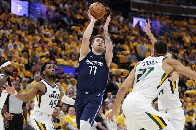 Luka Dončić med enim od metov. FOTO: Chris Nicoll/Usa Today Sports
