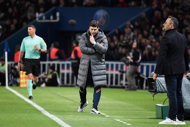 Mauricio Pochettino (na fotografiji), ki je na pariško klop sedel v drugi polovici lanske sezone in osvojil drugo mesto v prvenstvu, je po hitrem slovesu od izločilnih bojev lige prvakov 2021/22 tokrat z varovanci vendarle osvojil državno krono. FOTO: Alain Jocard/AFP
