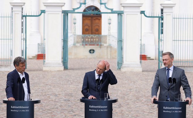 Finančni minister Christian Lindner, kancler Olaf Scholz, minister za gospodarstvo in podnebne politike Robert Habeck FOTO: Michele Tantussi/REUTERS
