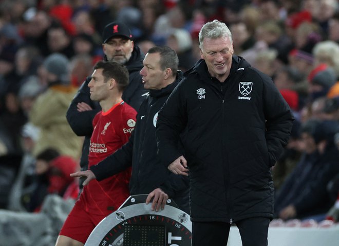 Zgolj Leicester in West Ham trenerja Davida Moyesa (desno) sta v tej ligaški sezoni premagala Liverpool, ki je v Londonu novembra klonil z 2:3. FOTO: Phil Noble/Reuters
