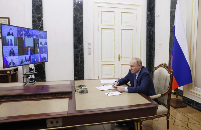 Bo Vladimir Putin kdaj stopil pred sodbo pravice? FOTO: Mihail Metzel/AFP
