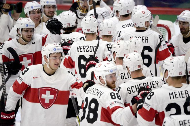 Švica se je veselila nove zmage. FOTO: Mikko Stig/AFP
