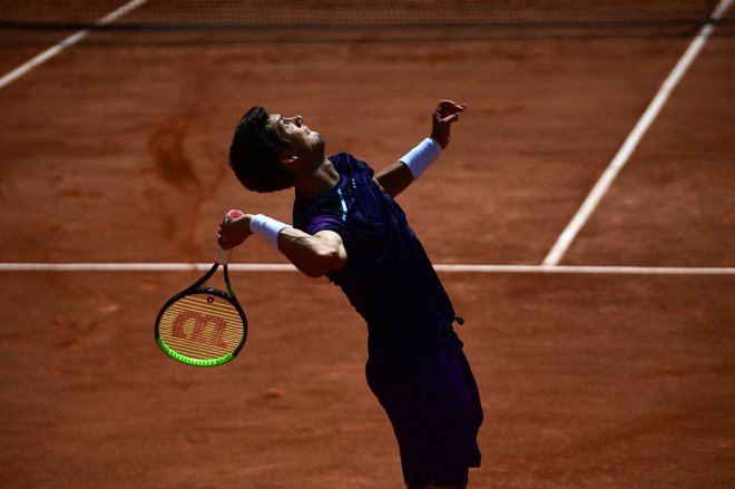 Aljaž&nbsp;Bedene se dobro znajde na pariškem pesku. FOTO: Martin Bureau/AFP
