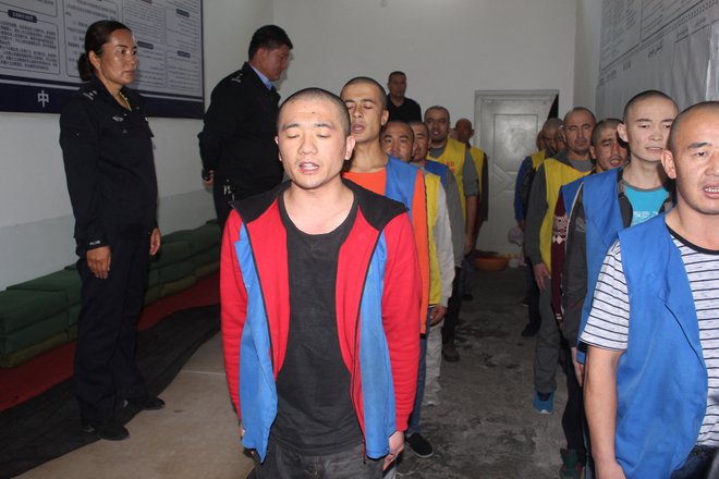 Hekerji so vdrli v računalniške strežnike xinjianške policije in jih dostavili Adrianu Zenzu, profesorju in aktivistu iz ameriške Spominske fundacije žrtev komunizma. FOTO: AFP
