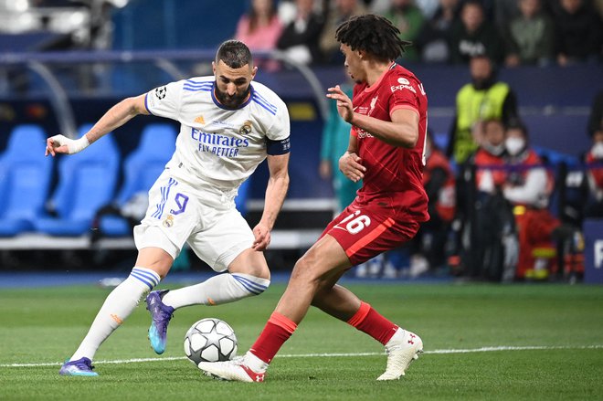 Karim Benzema je bil izbran za najboljšega igralca letošnje sezone lige prvakov. FOTO: Anne-Christine Poujoulat/AFP
