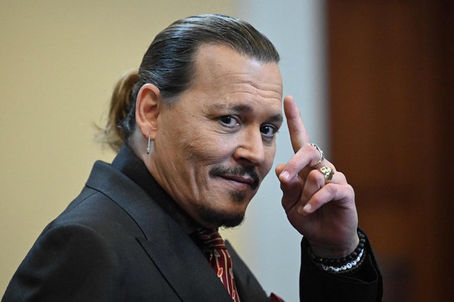 Zadovoljni Johnny Depp. Foto Jim Watson/Afp
