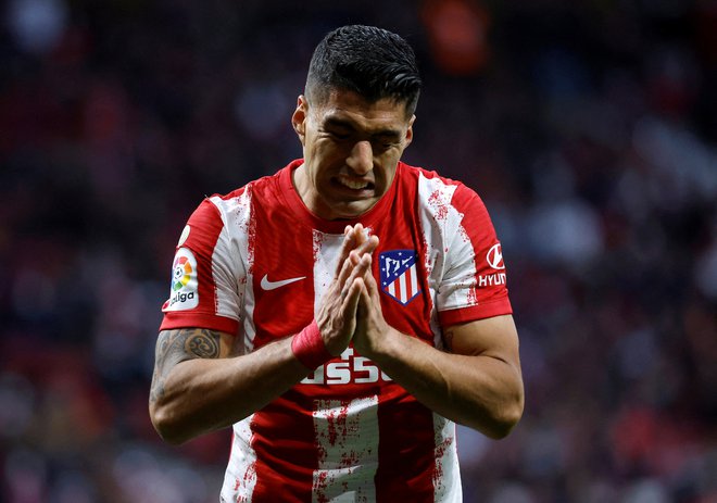 Luis Suarez je bil kot prvi strelec kluba junak Atleticove šampionske sezone 2020/21, v minuli pa je igral veliko bolj obrobno vlogo. FOTO: Juan Medina/Reuters
