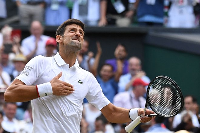 Novak Đoković je v Wimbledonu zmagal v letih 2011, 2014, 2015,&nbsp;2018, 2019 in 2021.&nbsp;FOTO: Ben Stansall/AFP
